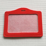 Porte carte bancaire horizontal en cuir rouge.
