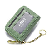 Porte carte bancaire sécurisé en cuir vert clair.