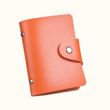 Porte cartes pour femme en cuir orange.