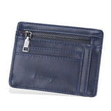 Porte carte de crédit avec poche à billets en cuir bleu.