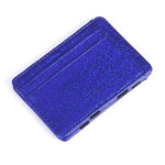 Porte carte magique pour femme en cuir à paillettes bleues.