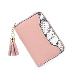 Portefeuille porte carte pour femme en cuir rose.